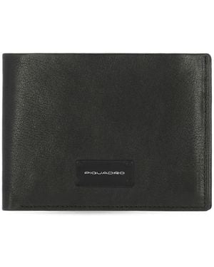 Piquadro Wandtattoo Mann Zeitschriften Schwarz