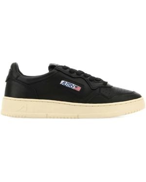 Autry Leather logo-patch sneakers - Schwarz