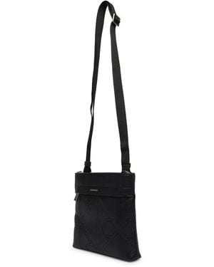 Calvin Klein Logo-Embossed Messenger Bag - Black