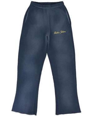 THIRTEENTH STUDIO Faded Logo-Print Track Trousers - Blue