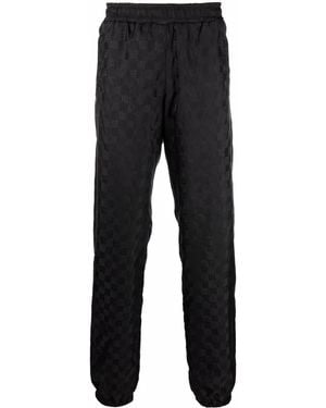 MISBHV Logo-Monogram Tapered Sweatpants - Black