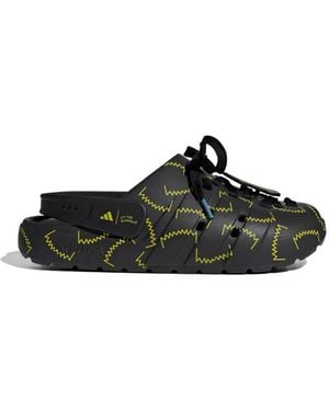 adidas X The Simpsons Adilette "Core Black/Yellow" Clogs - Schwarz