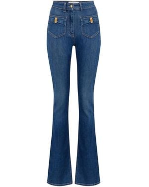 Elisabetta Franchi Vaqueros acampanados con detalle de lazo - Azul