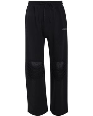 Les Benjamins Pantalones de chándal con efectos desgarrados - Azul