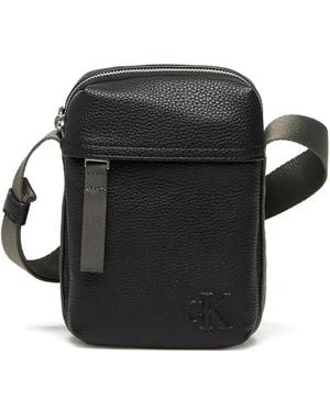 Calvin Klein Small Logo-Embossed Messenger Bag - Black