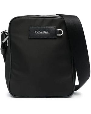 Calvin Klein Logo-Patch Messenger Bag - Black