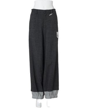 Maison Mihara Yasuhiro Pantalones A Capas Con Motivo Pied De Poule - Negro
