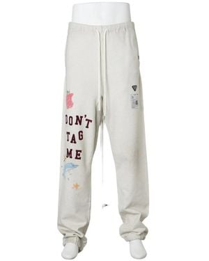 Maison Mihara Yasuhiro Pantalones De Chándal Con Garabatos Estampados - Blanco