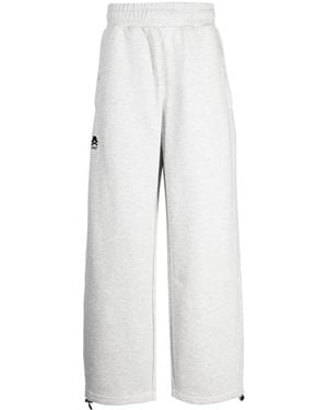 Izzue Logo-Appliqué Wide-Leg Trousers - White