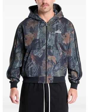 adidas Kapuzenjacke mit Camouflage-Print - Blau