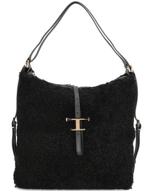 Tod's Schultertasche aus Shearling - Schwarz