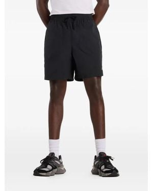 New Balance Castlefield Woven 7" Shorts - Black