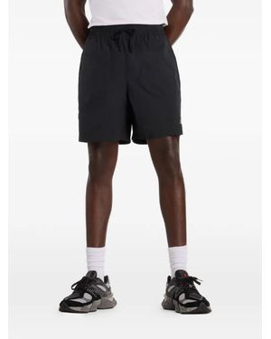 New Balance Castlefield Woven 7" Shorts - Black