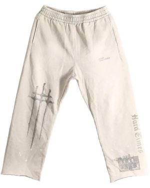 SAITOS Sword Graphic-Print Raw-Cut Track Trousers - Natural