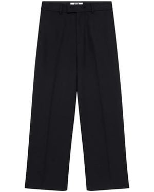 MSGM Logo-Embroidered Pressed-Crease Trousers - Blue