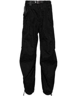 and wander Pantaloni Affusolati Con Zip Laterale - Nero