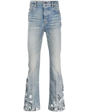 Amiri Paint-splattered Flared-leg Stretch-denim Jeans - Blue