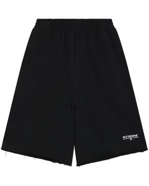 we11done Logo-Print Raw-Edge Shorts - Black