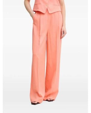 Lola Casademunt Logo-Plaque Pleated Palazzo Trousers - Pink