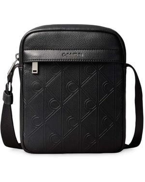 Calvin Klein Monogram-Embossed Messenger Bag - Black