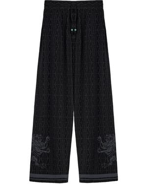 Domaine Des Artistes Lion-Embellished Patterned Silk Trousers - Black