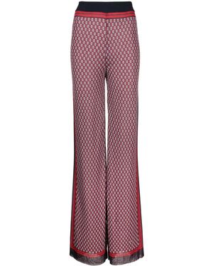 Balmain Pb Monogram-print Knitted Pants - Purple