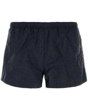 Prada Logo-Plaque Pocket Swim Shorts - Blue
