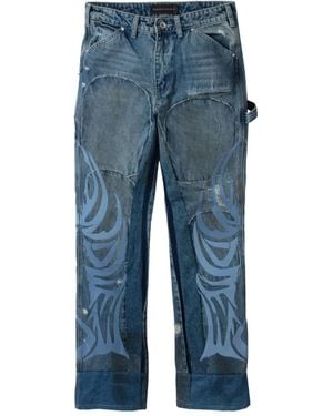 Who Decides War Jeans Met Vlammenpatroon En Patches - Blauw