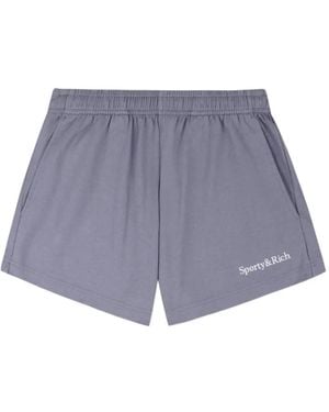 Sporty & Rich Serif Logo Disco Shorts - Purple