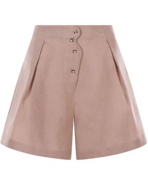Mia Peculiar Wave-Design Pleated Shorts - Pink