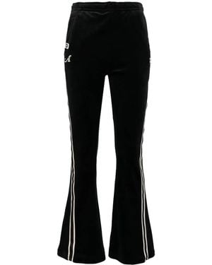 Aape By A Bathing Ape Pantalones acampanados con parche del logo - Negro