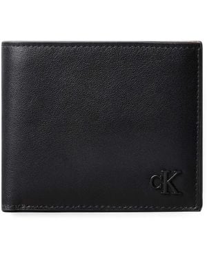 Calvin Klein Logo-Embossed Bi-Fold Wallet - Black
