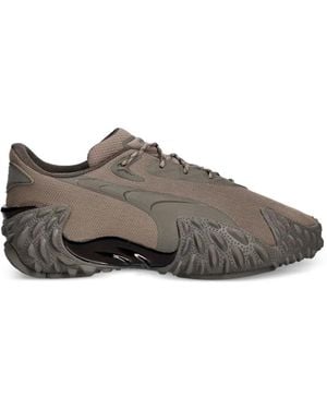PUMA Mostro X Dots Sneakers - Grau