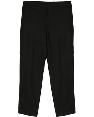 Undercover Pantalones ajustados elásticos - Negro
