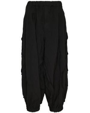 COMME DES GARÇON BLACK Patchwork Raw-Cut Trousers - Black