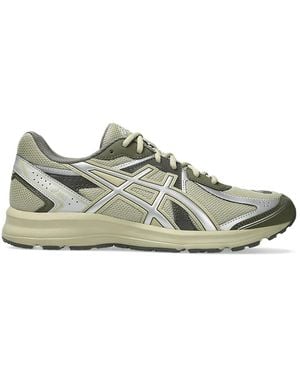 Asics JOG 100S Sneakers - Grün