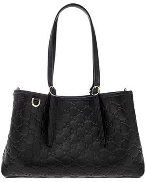 Gucci Bolso de hombro mediano de piel con logo GG - Negro