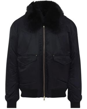 Moose Knuckles Chaqueta con cuello de pelo artificial - Negro