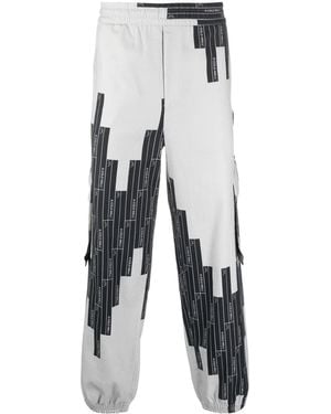 A_COLD_WALL* Pantaloni Affusolati Con Monogramma Vector - Bianco