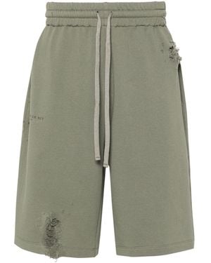 ih nom uh nit Logo-Print Distressed Shorts - Green