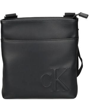 Calvin Klein Embossed-Logo Messenger Bag - Black