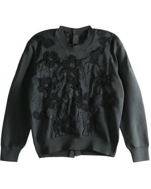 Comme des Garçons Jersey con aplique floral - Negro