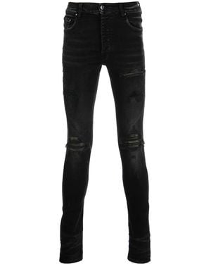 Amiri Distressed Skinny Jeans - Black