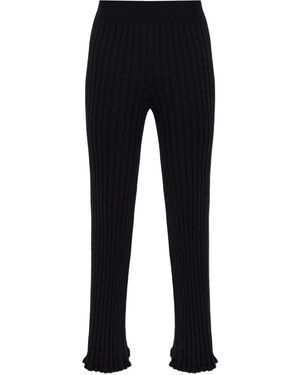 Lisa Yang Ribbed-knit flared trousers - Schwarz
