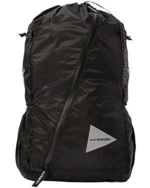 and wander Drawstring Zip Backpack - ブラック