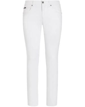 Dolce & Gabbana Vaqueros Slim Con Placa Del Logo - Blanco