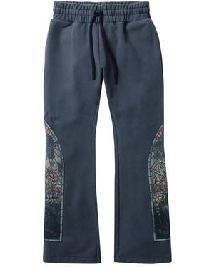 Who Decides War Printed Track Trousers - Blue