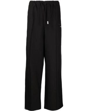 Izzue Logo-Plaque Straight-Leg Trousers - Black