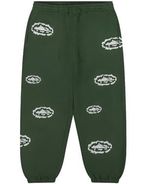 DENIM TEARS X Corteiz Island Wreath Track Trousers - Green
