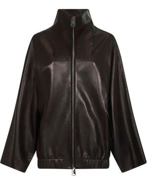 KHAITE Chaqueta con cremallera y cuello alto - Negro